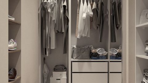 Stylish walk-in closet with neutral tones and contemporary design elements.