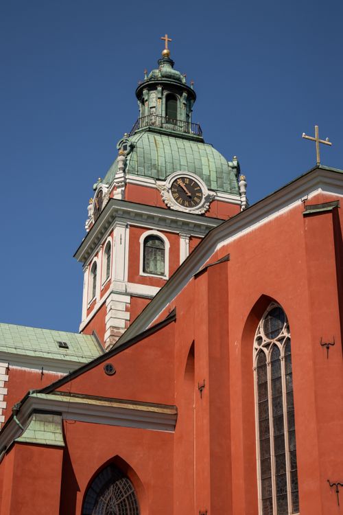 Free St. James's Church with its distinctive architecture in Stockholm, captured under a clear blue sky. Stock Photo