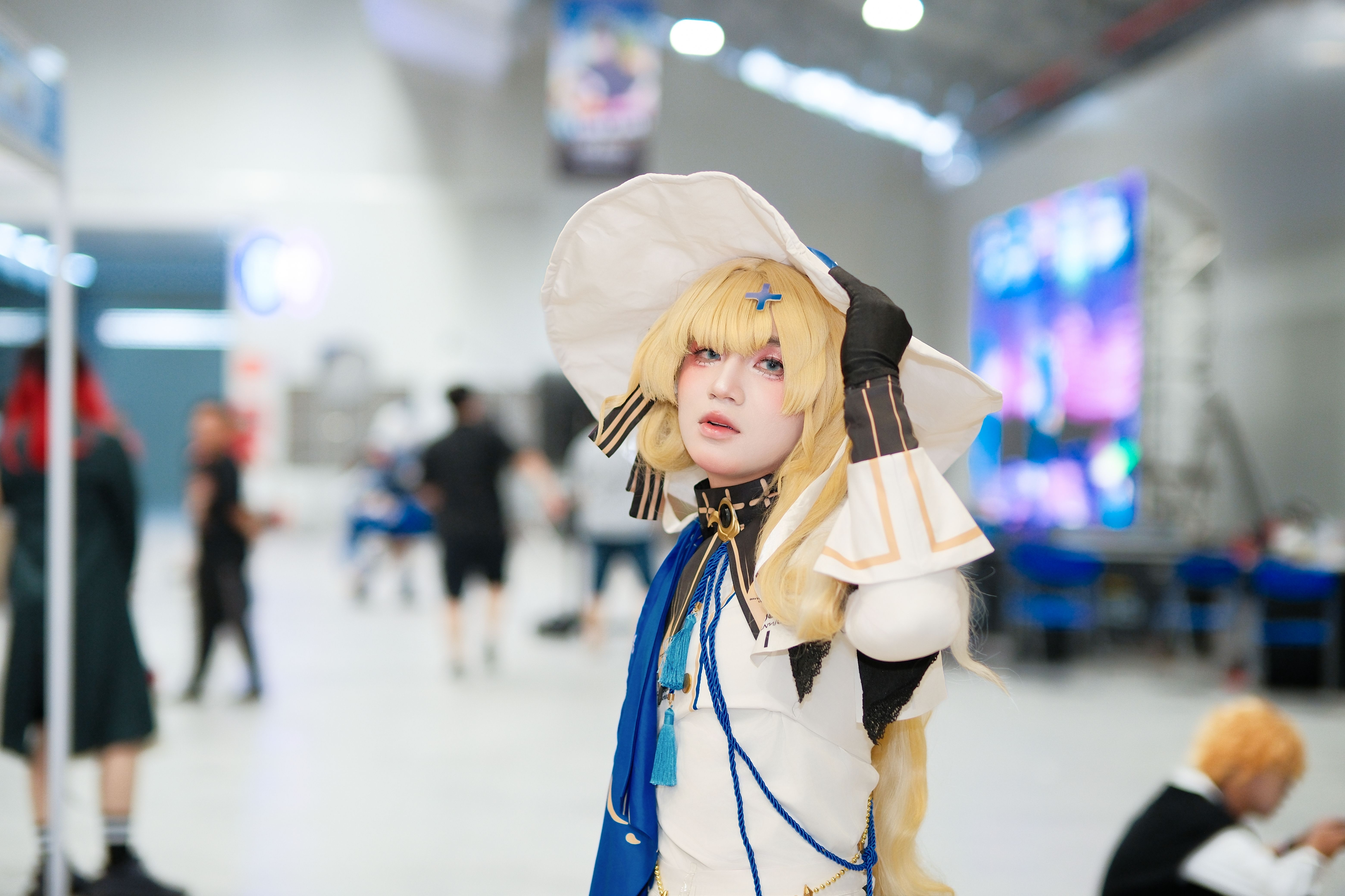 Cosplayer in Fantasy Costume at Convention Center
