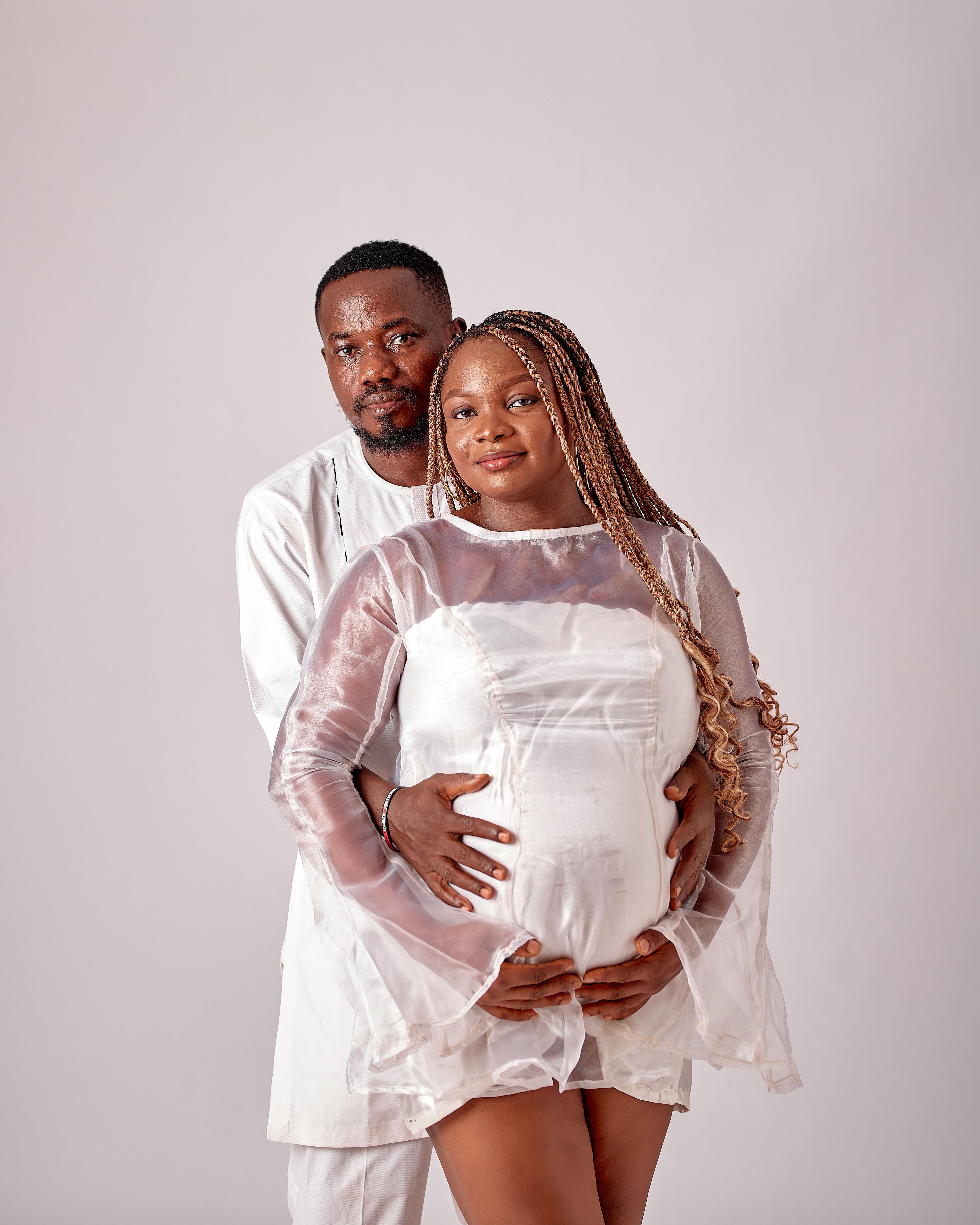 Elegant Maternity Portrait with Expectant Couple · Free Stock Photo