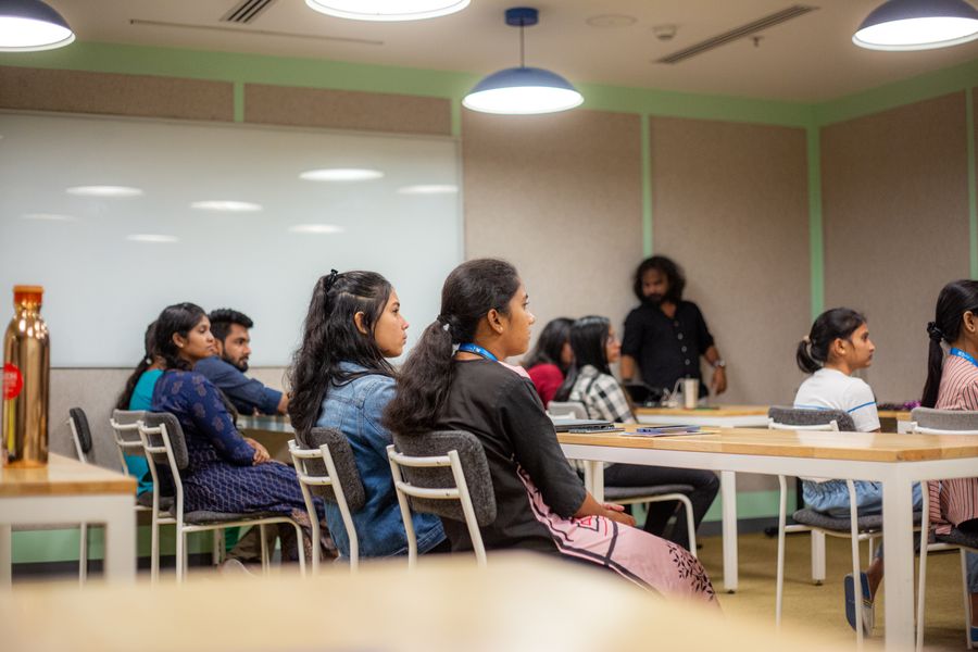 Diverse adults participating in a modern learning session