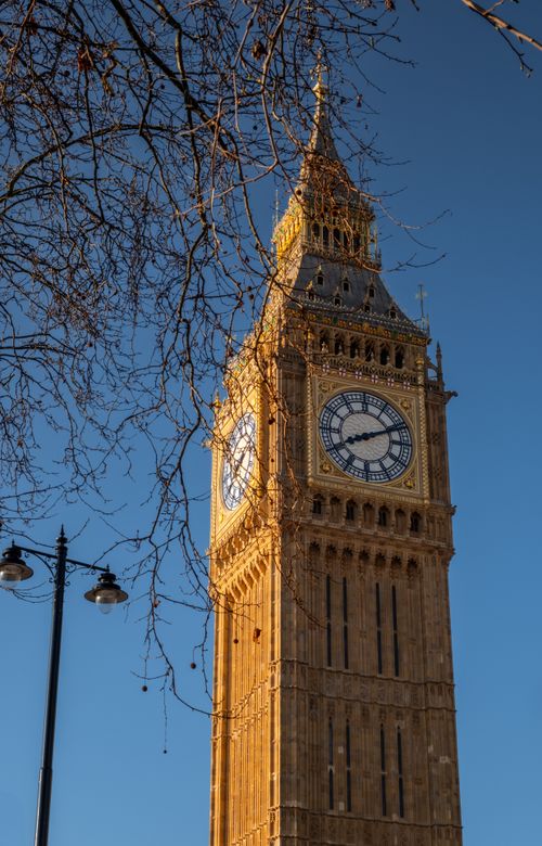 Free Stunning view of Big Ben in London highlighting architectural details against a clear blue sky. Stock Photo
