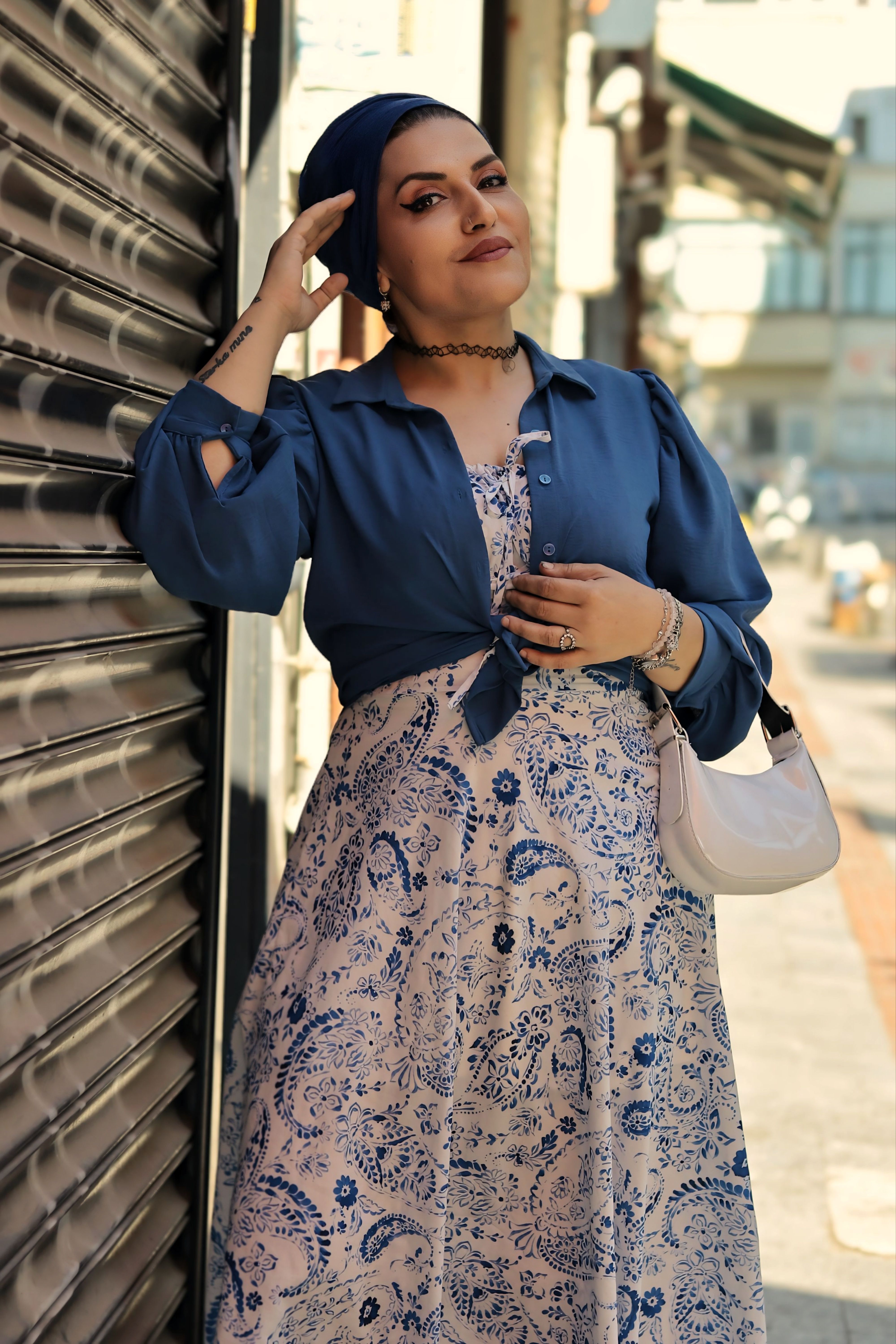 Stylish Woman Posing Outdoors in Urban Setting · Free Stock Photo