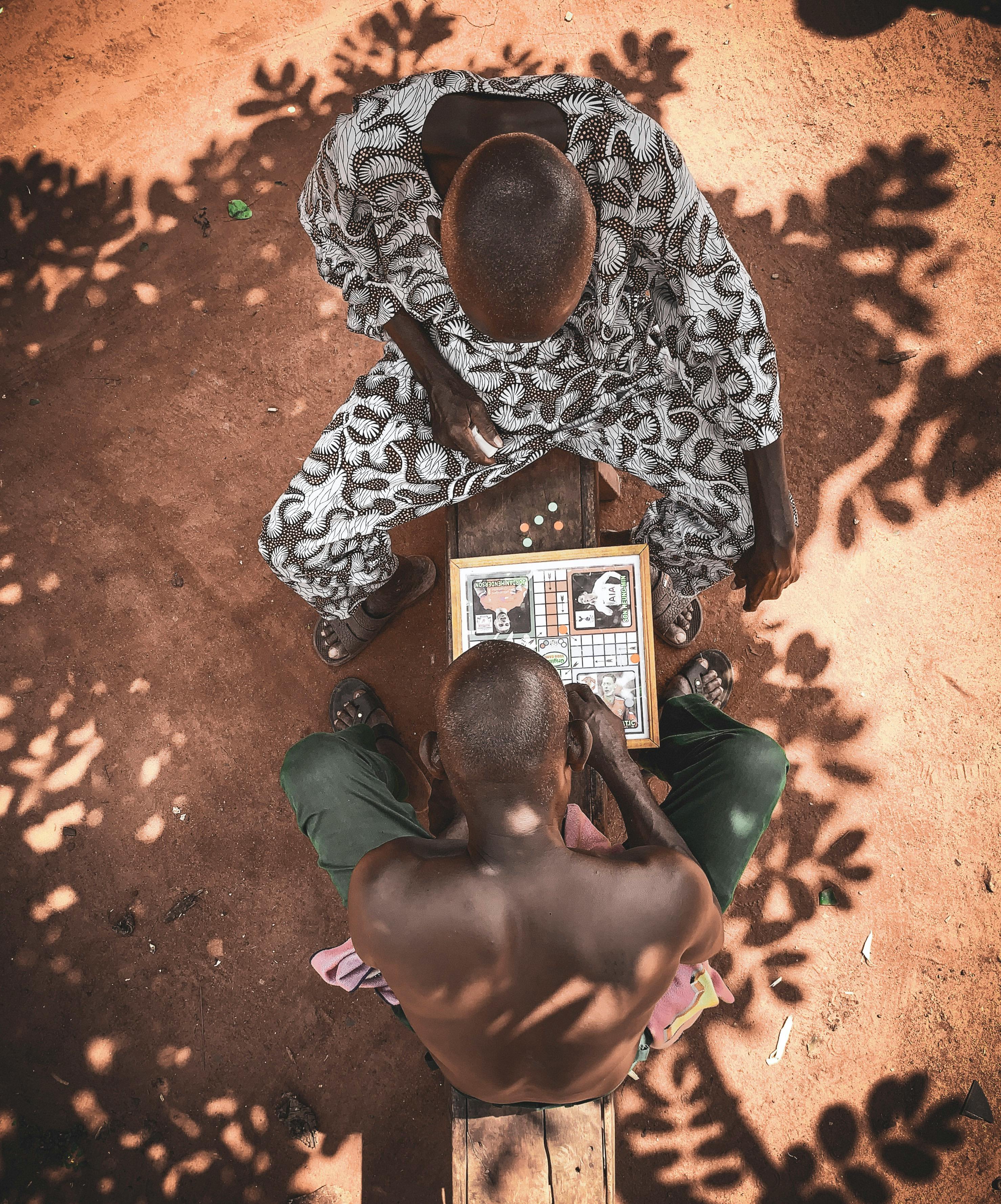 top view photo of men playing board game