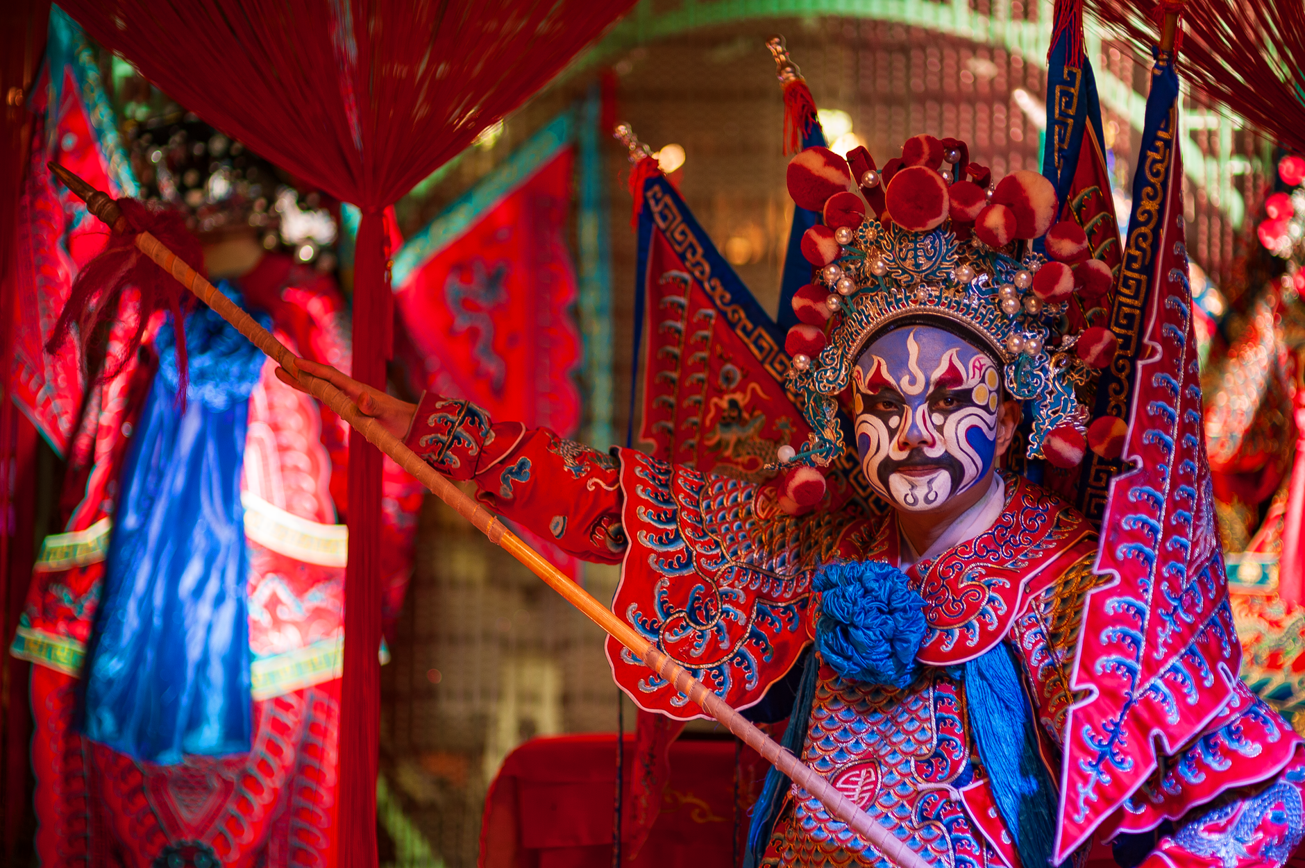 Beijing opera performer elaborate costume — Photo by Vincent Tan