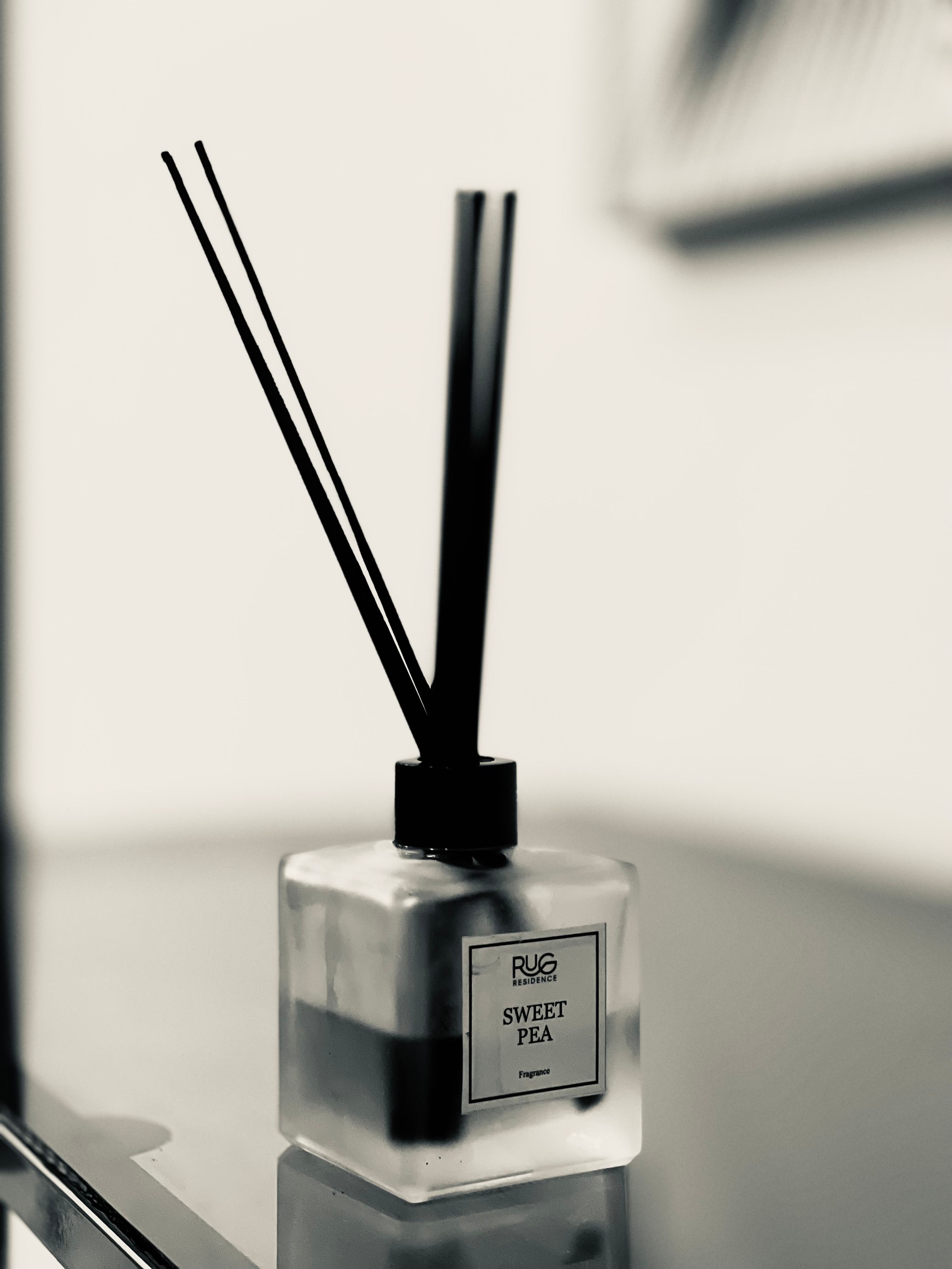 Elegant Reed Diffuser with Sweet Pea Fragrance · Free Stock Photo