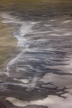 Stunning aerial view of flowing river patterns across the landscape in Broome, Western Australia.