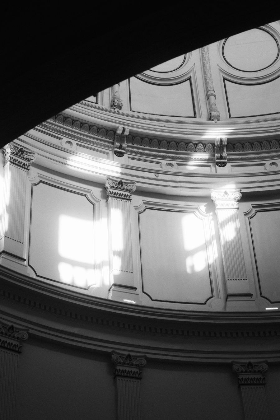 Black and white architectural interior with refined structural detail