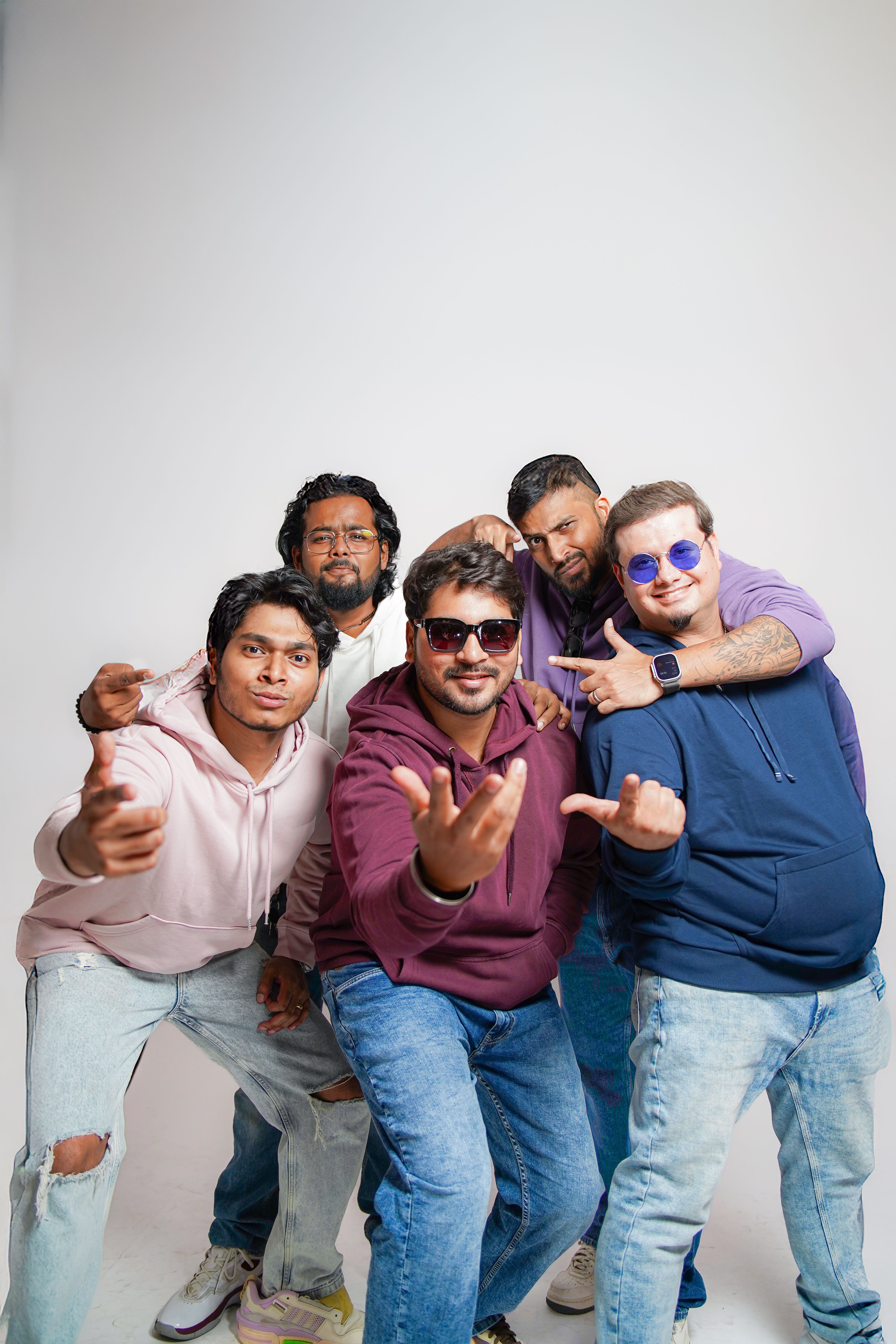 Diverse Group of Friends Posing in Studio · Free Stock Photo