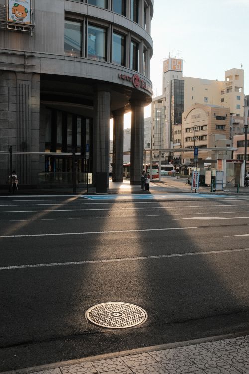Urban Street Scene with Modern Architecture at Dusk · Free Stock Photo
