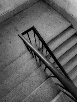 Explore the geometric beauty of this black and white brutalist staircase.