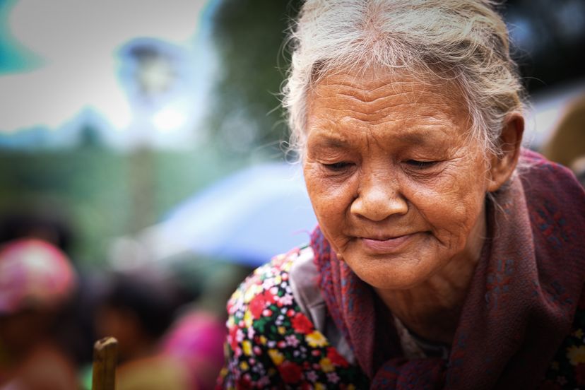 Elderly woman looking downward