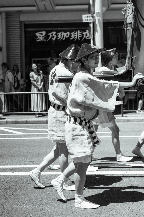 Free Participants in traditional attire at a Japanese festival parade, showcasing cultural heritage. Stock Photo