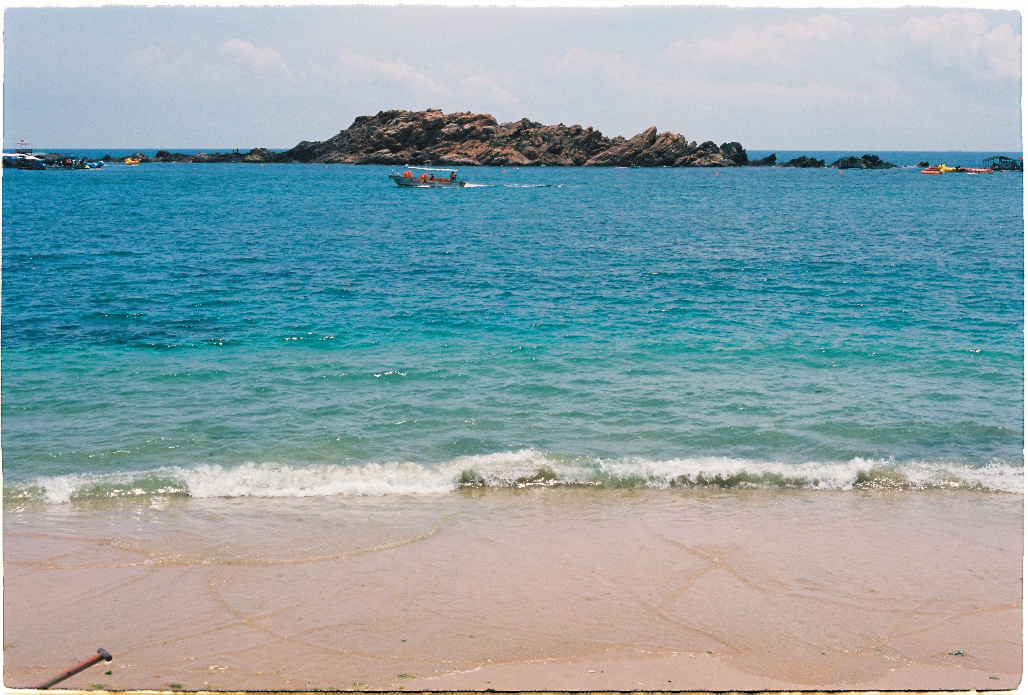 Swim the sandbar at Nissi Beach