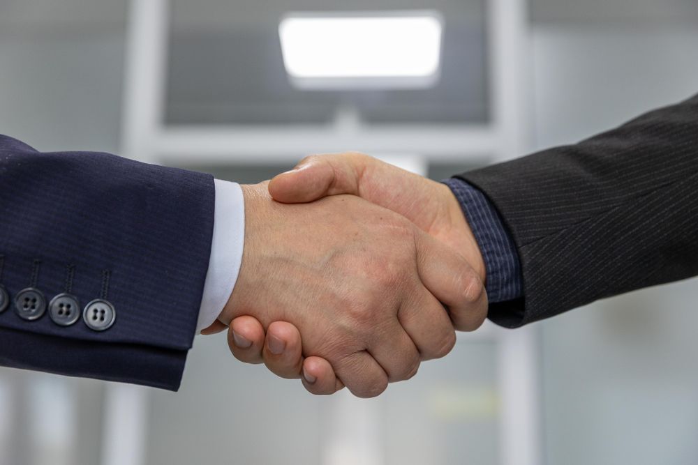 Business handshake sealing a partnership agreement