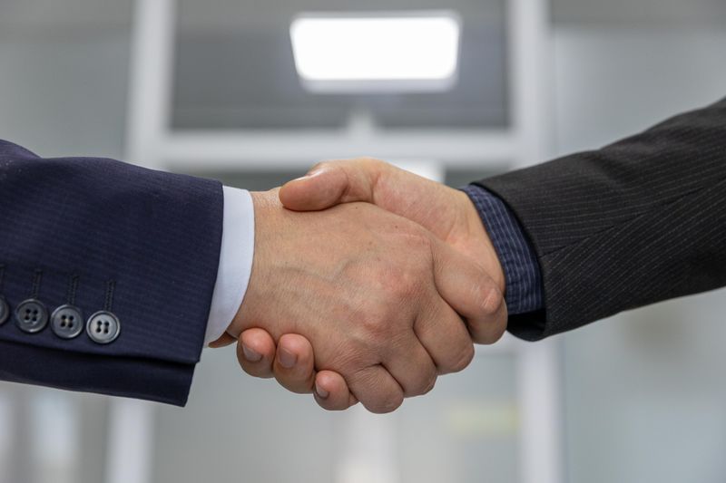 Business handshake signifying a partnership