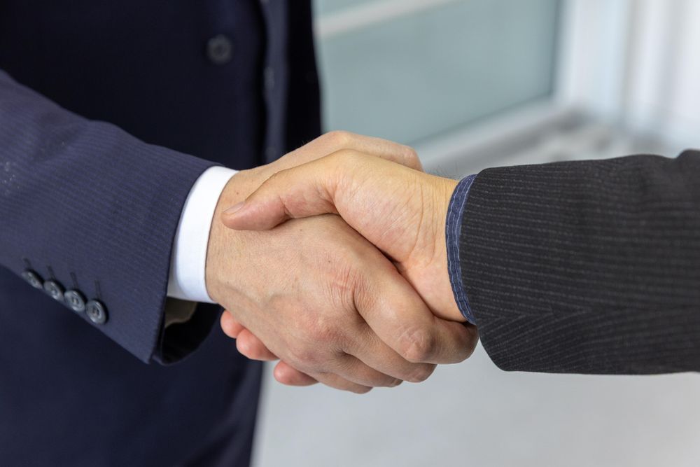 Professional handshake between business partners