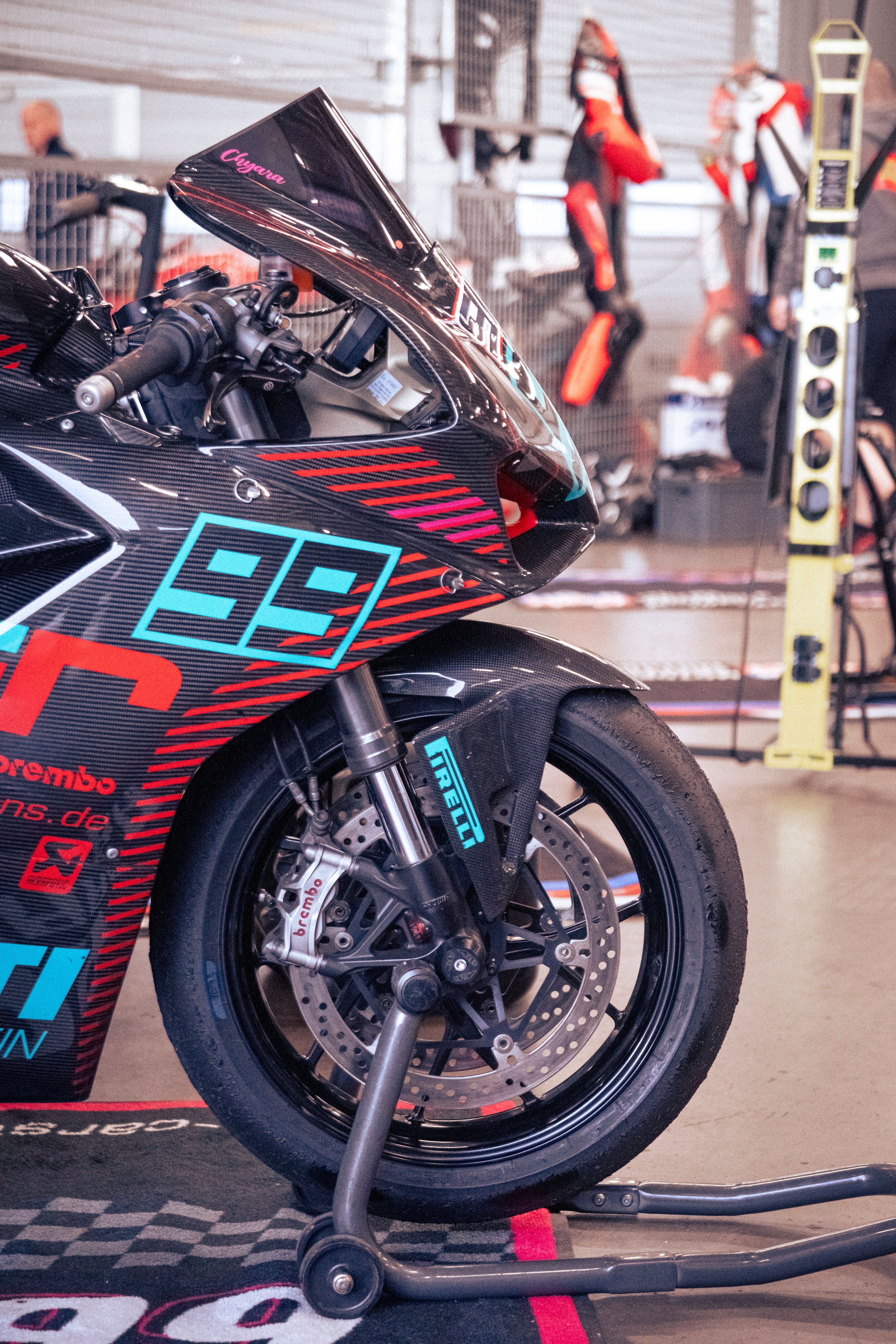 High-Performance Motorcycle at Nürburgring Garage · Free Stock Photo