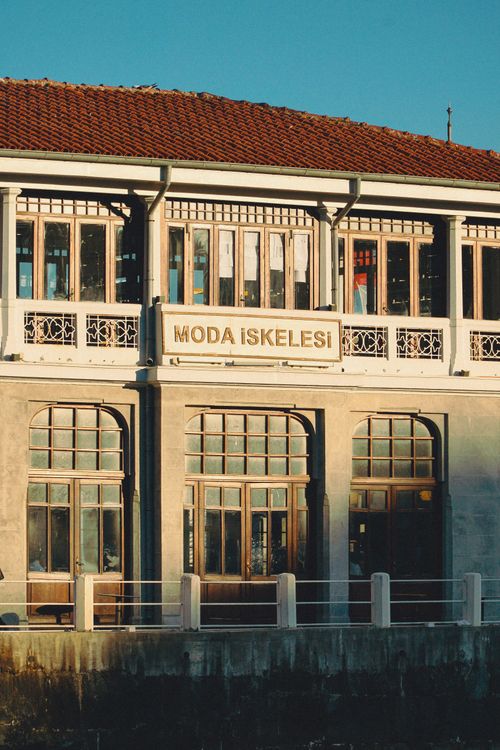 Free Historic Moda Iskelesi building facade in warm sunlight, showcasing classic architecture in Istanbul. Stock Photo