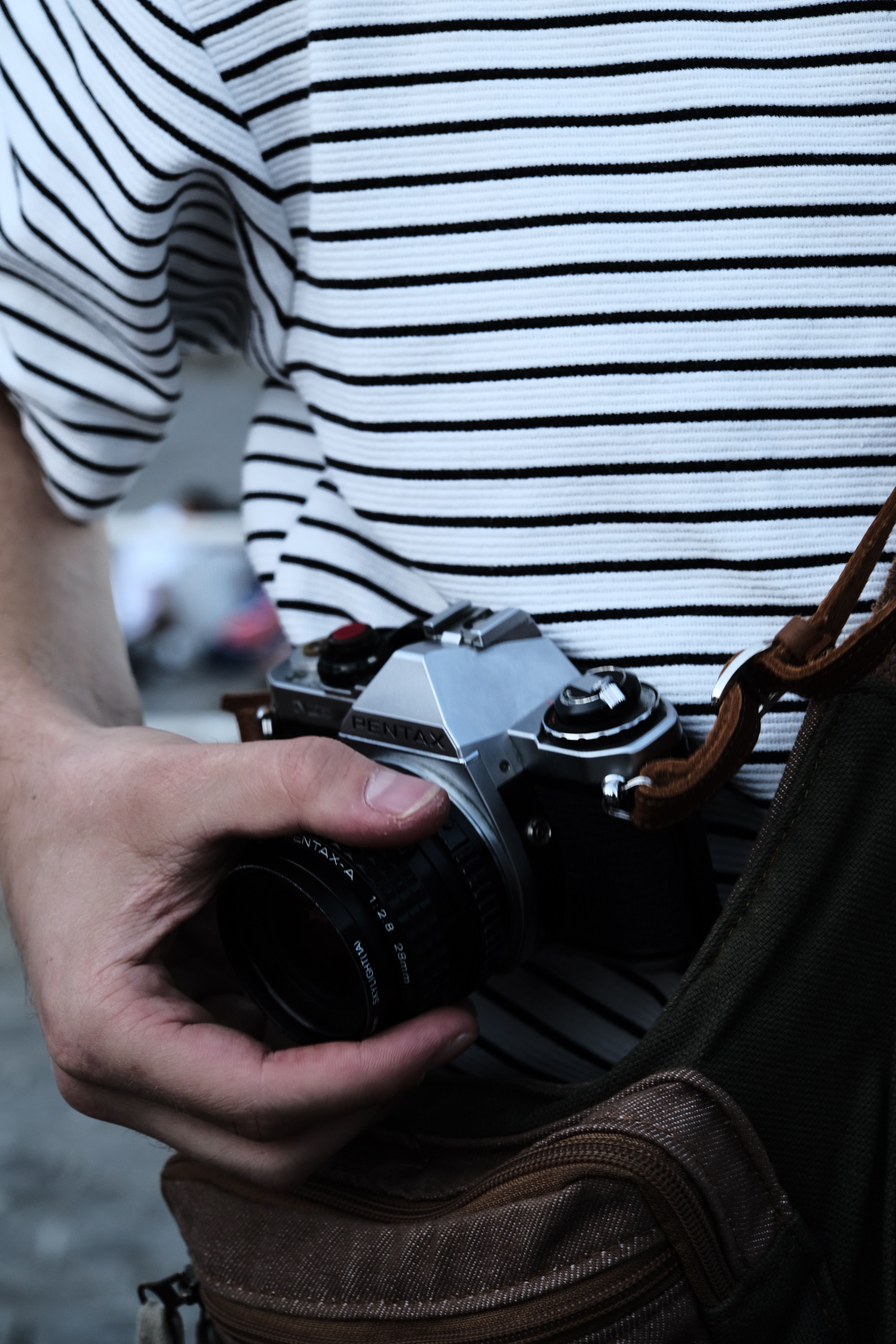 Person Holding Vintage Camera Outdoors · Free Stock Photo