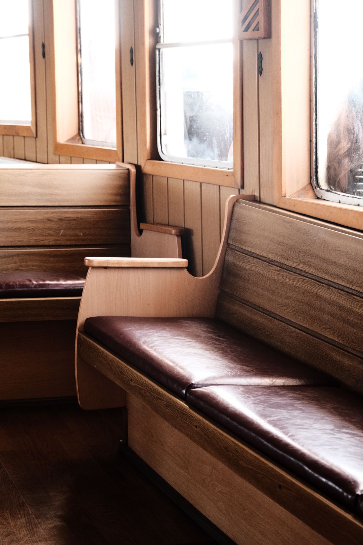 Inside vintage train car wooden bench