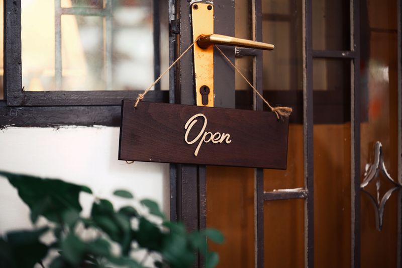 Open sign in a storefront door