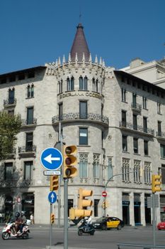 Architectural photo of a Gothic-style building in Barcelona, Spain, captured during the day.