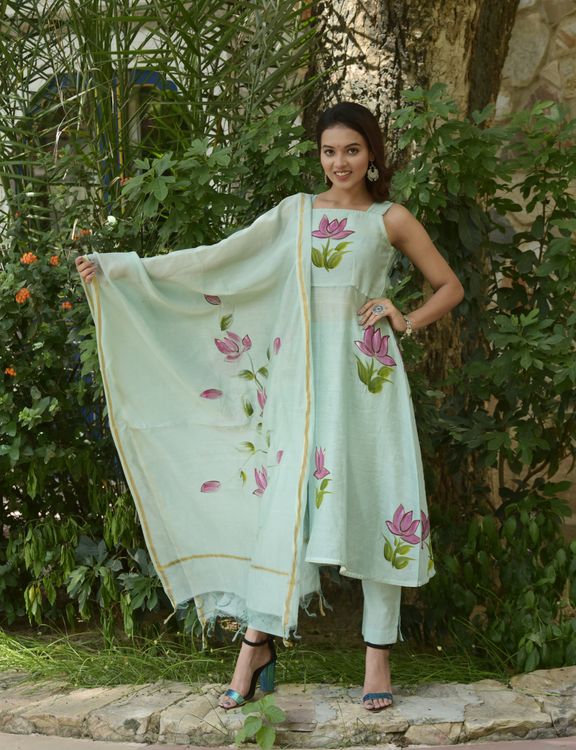 Woman Posing in Floral Dress Outdoors · Free Stock Photo
