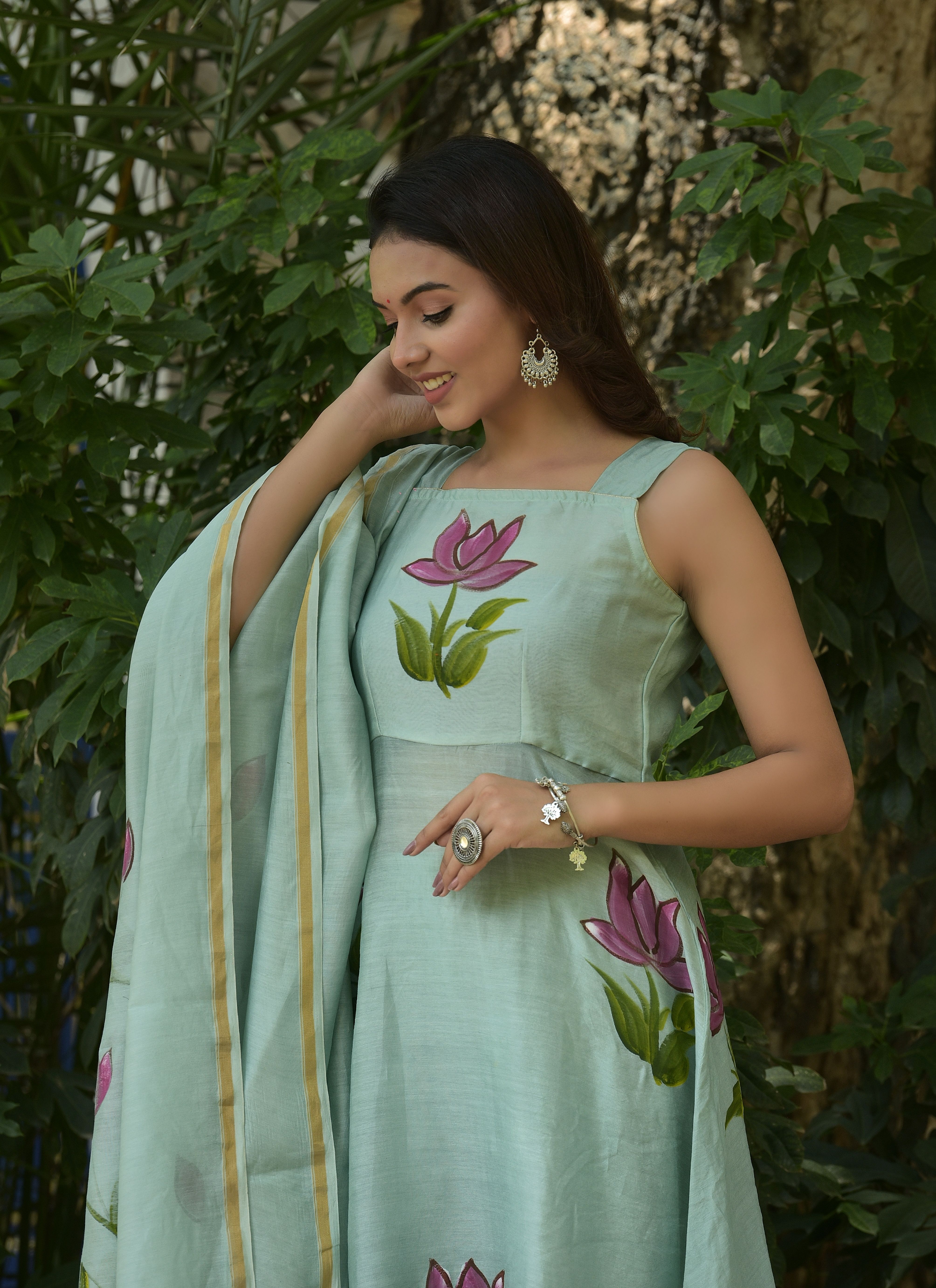 Elegant Woman Posing Outdoors in Stylish Attire · Free Stock Photo