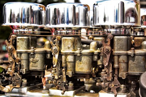 Free Detailed view of vintage Ford engine components with chrome accents at a car show in Marshfield, Wisconsin. Stock Photo