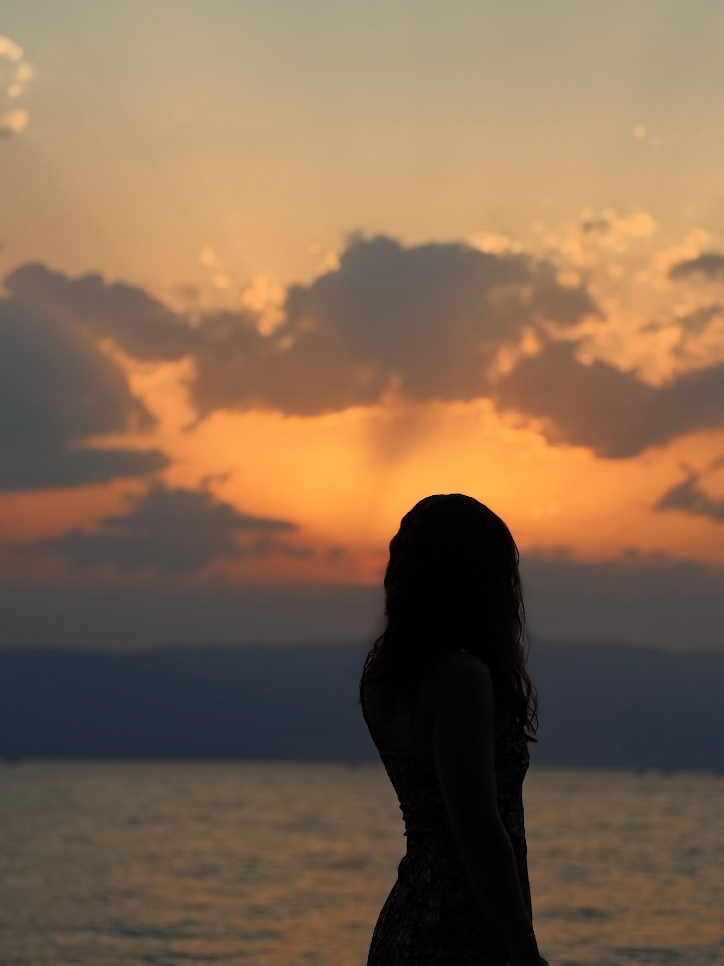 Silhouette of Woman at Sunset Beach · Free Stock Photo