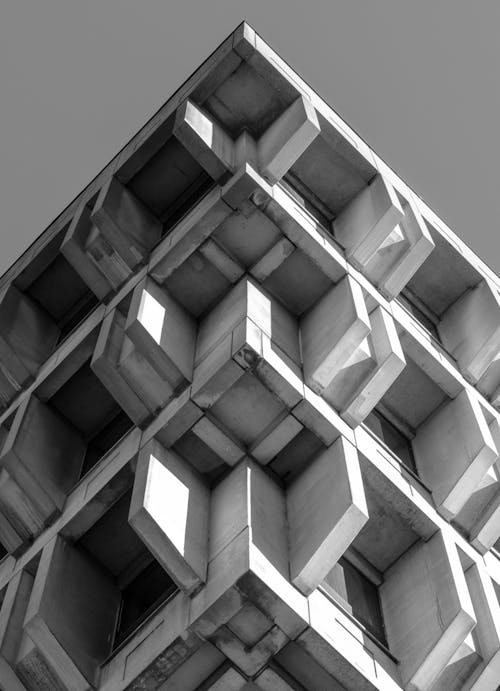 Grayscale Photo of Concrete Building