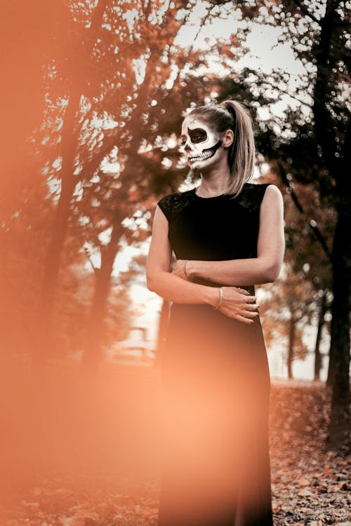 Photo Of Woman Wearing Black Dress