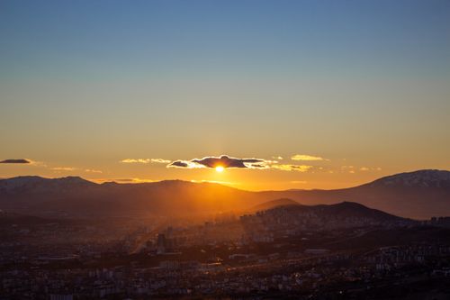 Free Stunning sunset over Elazığ, Türkiye, with silhouetted mountains and cityscape in the foreground. Stock Photo