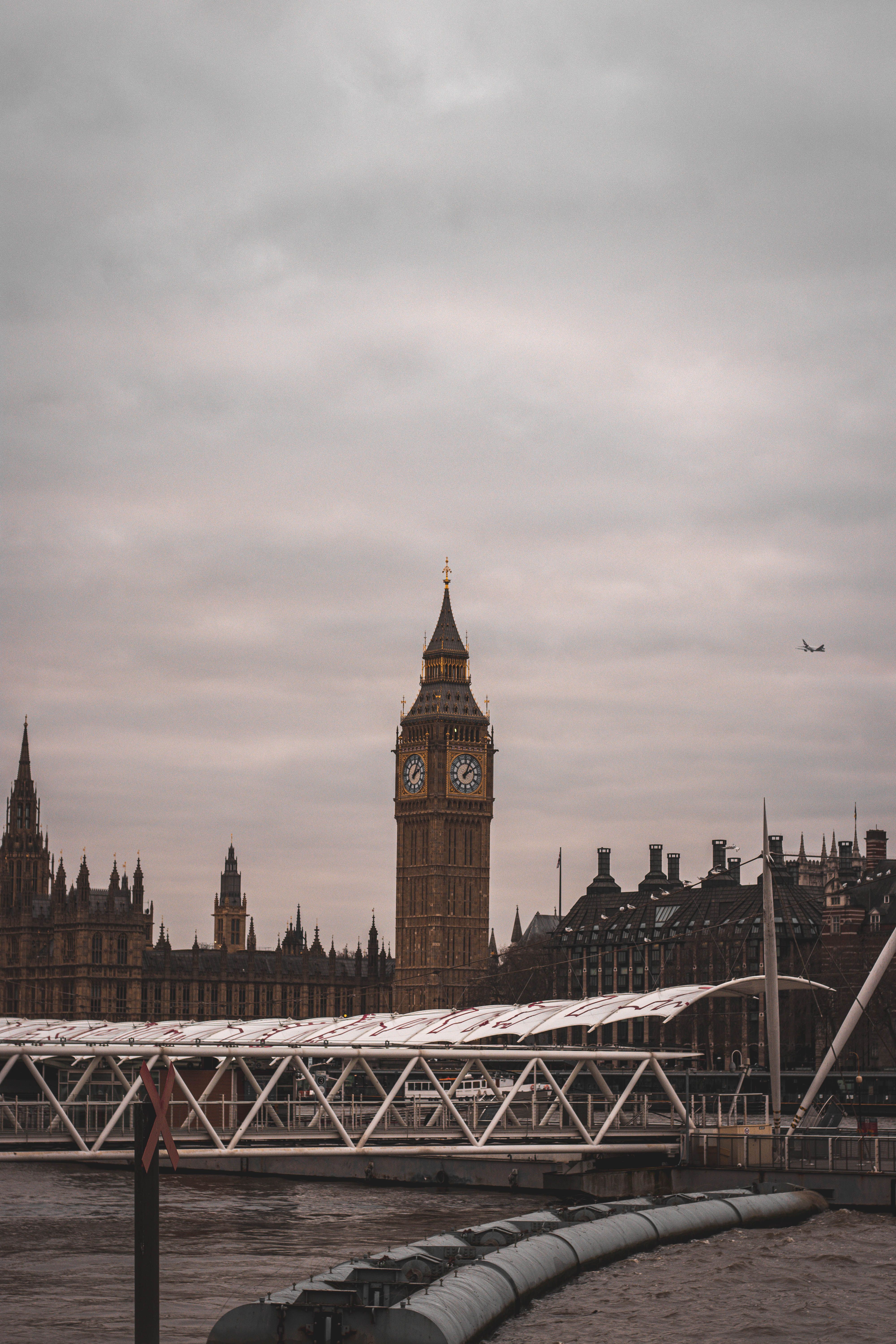 Big Ben and the Elizabeth Tower seen from Westminster Bridge over the River Thames in London at sunset