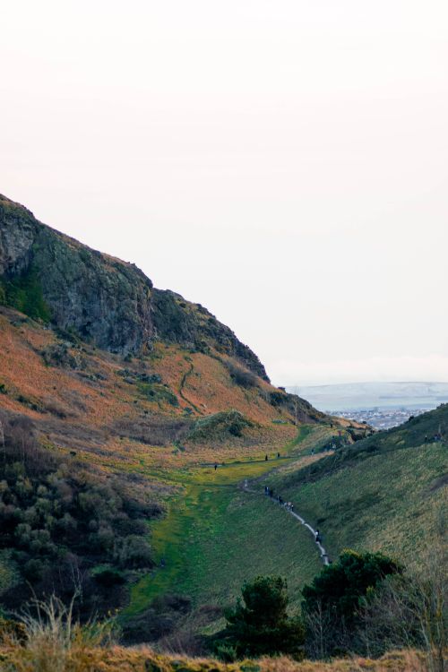 Free Breathtaking view of Arthur's Seat, Edinburgh, showcasing lush greenery and rugged terrain. Stock Photo