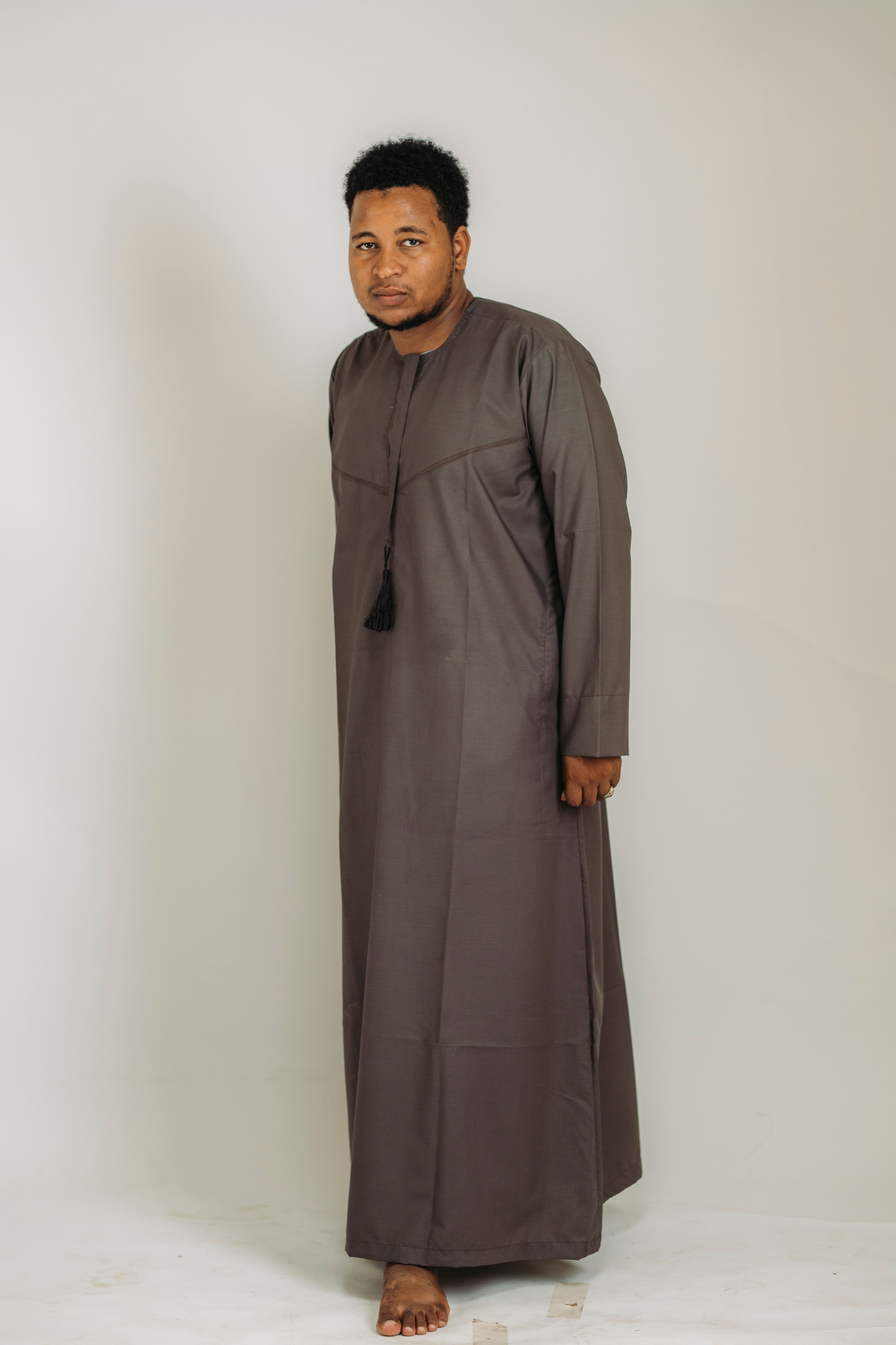 Man Wearing Traditional Long Robe in Studio · Free Stock Photo
