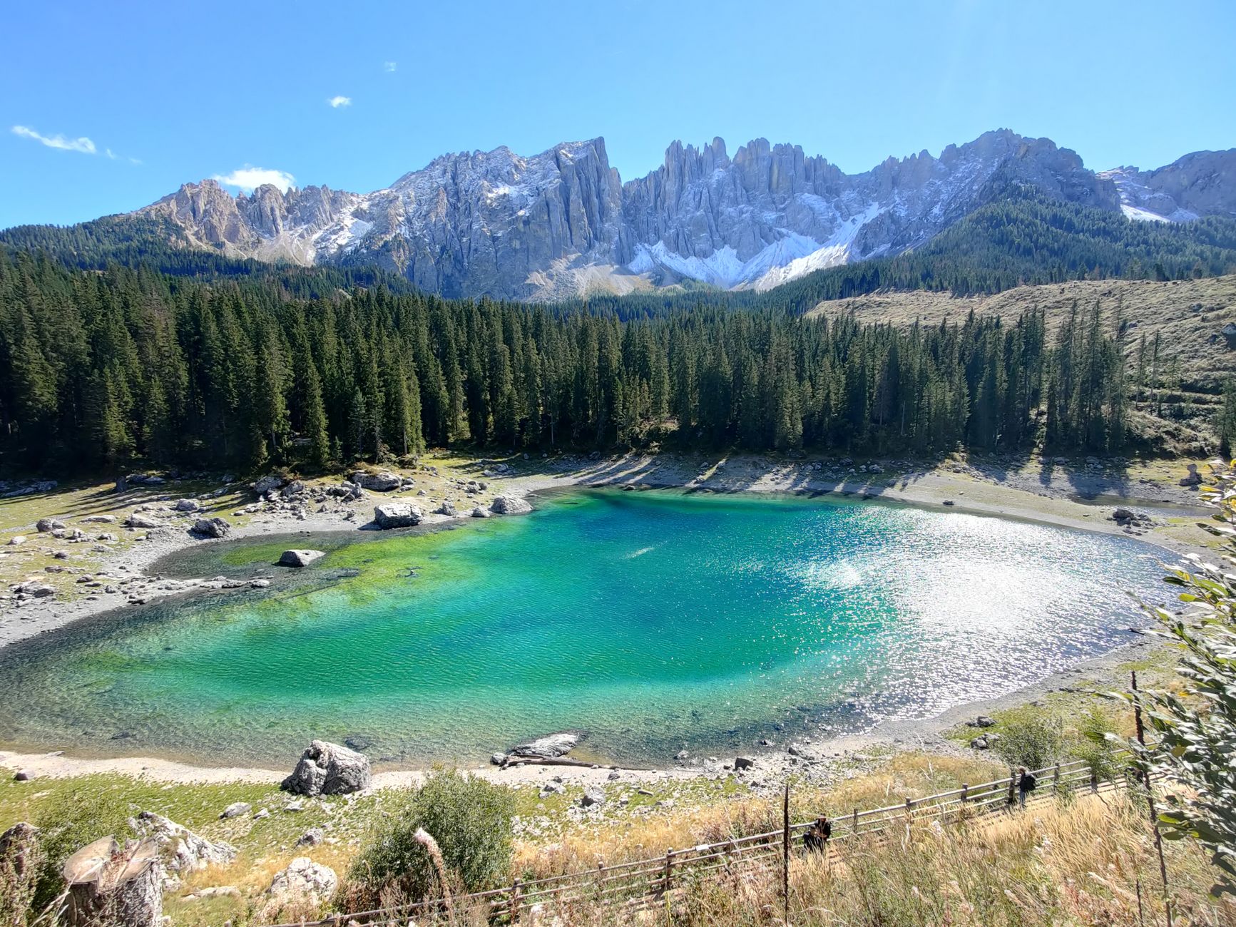 Stunning emerald lake with Dolomites backdrop in Trentino-South Tyrol, Italy.