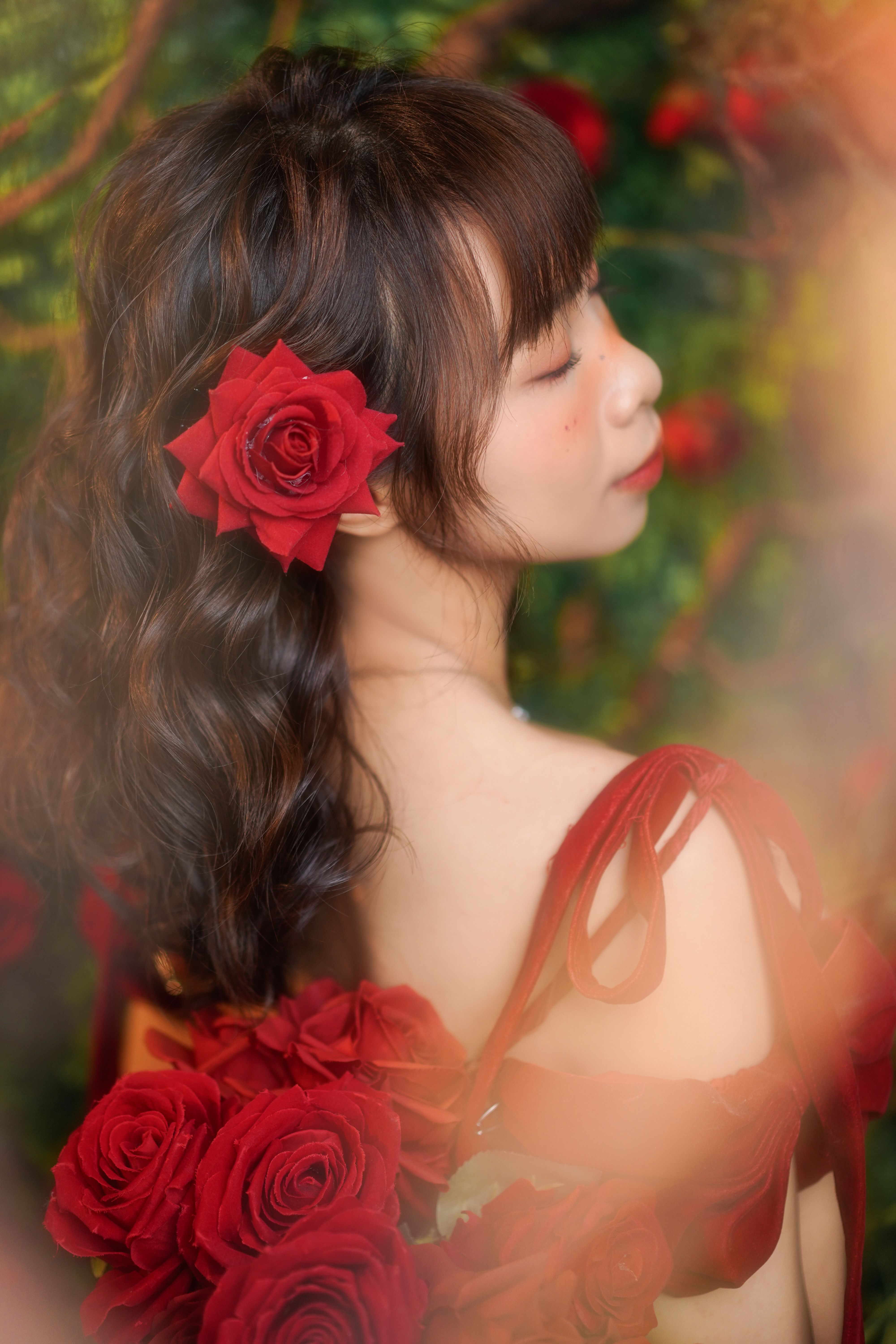 Elegant Portrait of Woman with Red Roses · Free Stock Photo