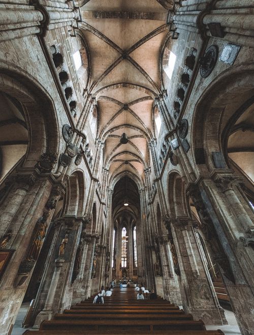 Free Gothic architecture of St. Sebaldus Church interior with vaulted ceilings and columns, Nuremberg, Germany. Stock Photo