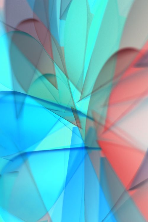 Free Vibrant abstract shapes with colorful lighting and shadows in blue and red hues. Stock Photo