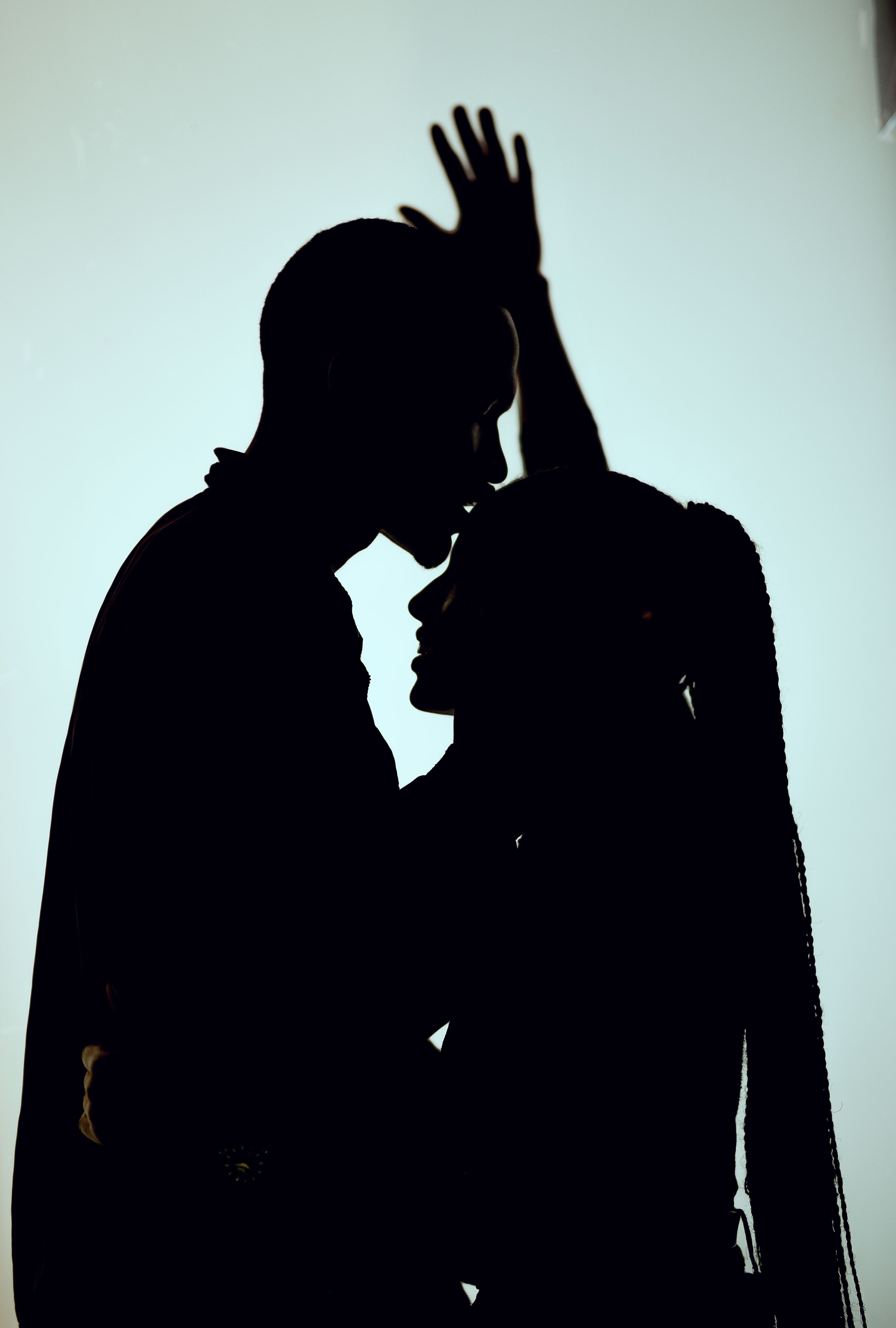 Silhouette Photo of Man and Woman Kissing · Free Stock Photo