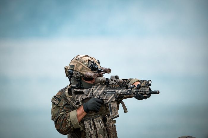 Soldier in camouflage tactical gear