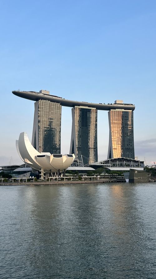 Free Stunning view of Marina Bay Sands and ArtScience Museum against a tranquil sky in Singapore. Stock Photo