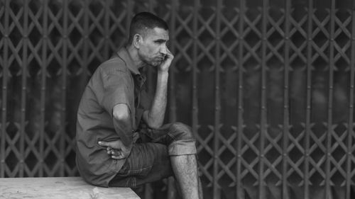Free A thoughtful portrait of a man in Bangladesh, highlighting resilience and contemplation. Stock Photo