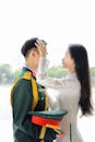 Vietnamese Couple in Military Uniform by Lake