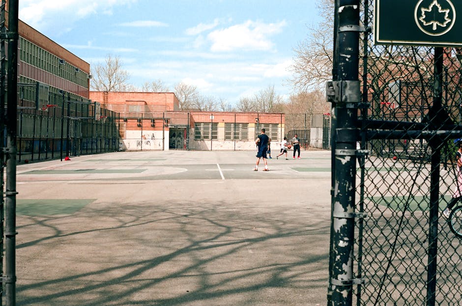 children playing on a newly finished sports court - sports court flooring company children playing on a newly finished sports court - sports court flooring company