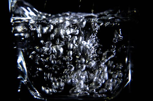 Close-up of Water Splashing Against Black Background