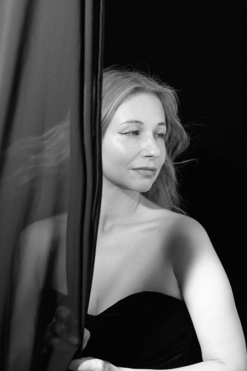 Free Graceful black and white portrait capturing the beauty and mystery of a woman. Stock Photo