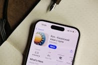 Smartphone Displaying Kazakh Language App